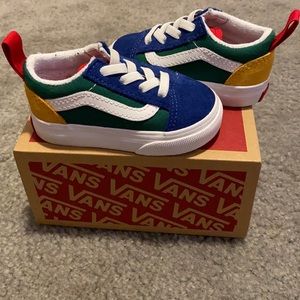 Low top Multi color Vans with elastic laces for easy slip on